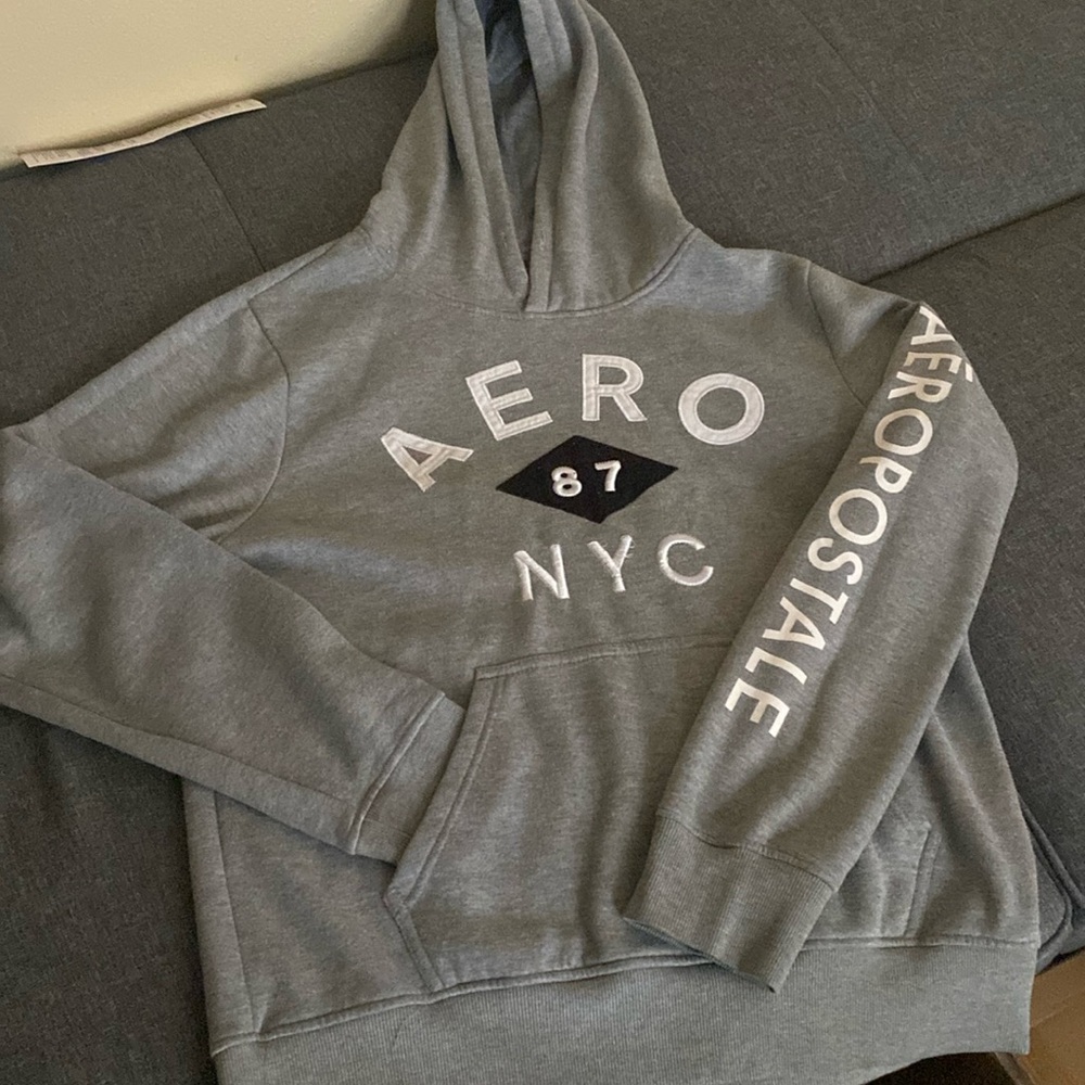 A Gray Hoodie with NYC on front